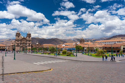 Cityscape of main square in Cusco, Peru, with scenic sky