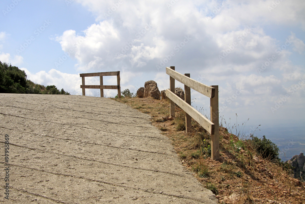 MONTSERRAT, SPAIN - AUGUST 28, 2012: Hiking paths in the mountains near Benedictine abbey Santa Maria de Montserrat in Monistrol de Montserrat, Spain