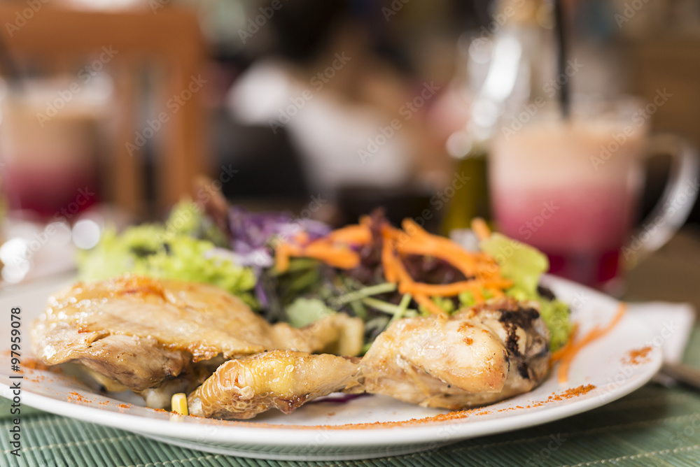Grilled chicken Legs and thigh with salad Grilled chicken Legs and thigh with salad