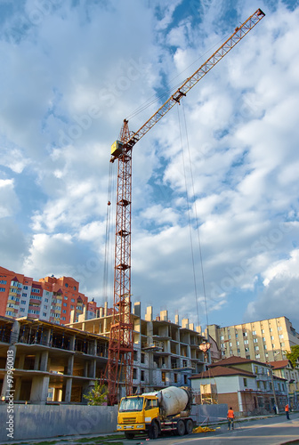 Crane building construction with blue sky background