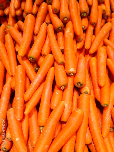 The fresh orange carot in the market close up