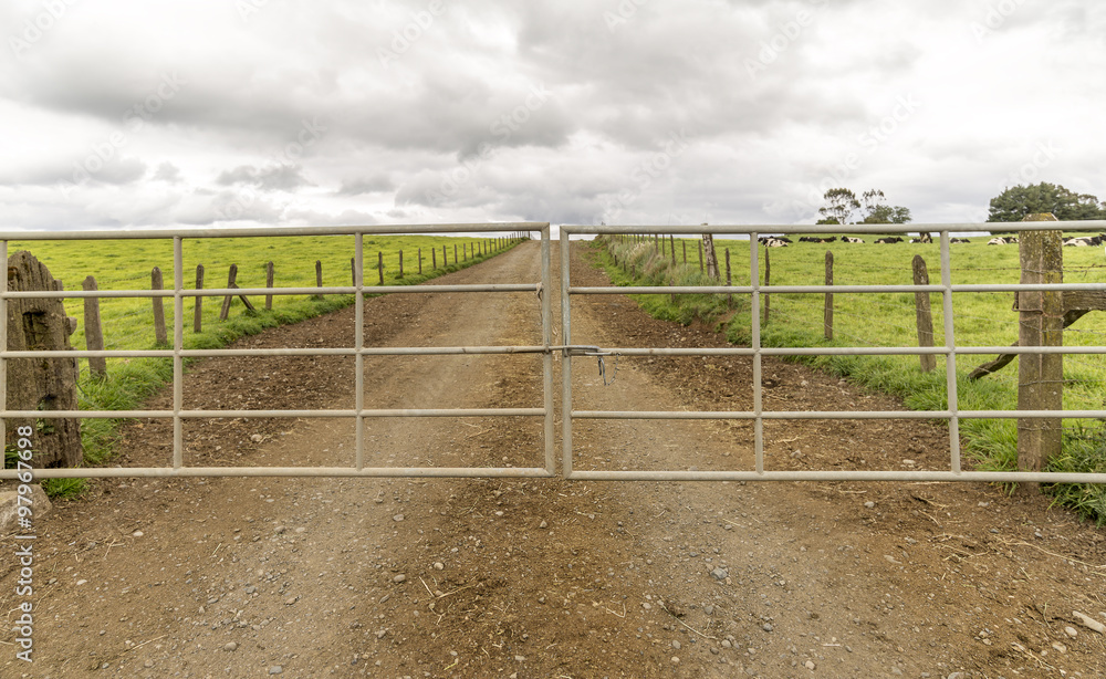 an iron gate to a farm an iron gate to a farm