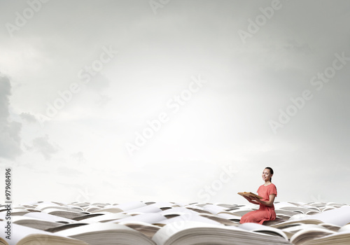 Woman in dress with book