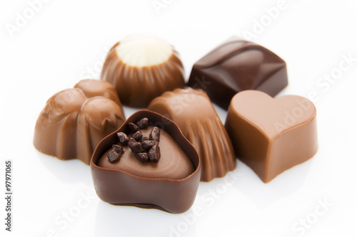 Several Assorted chocolates dark isolated white chocolats