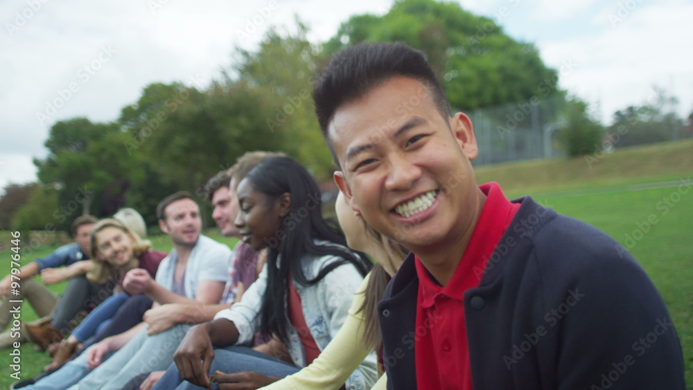 Happy close friends together outdoors Could be student group or young Christians Happy close friends together outdoors Could be student group or young Christians