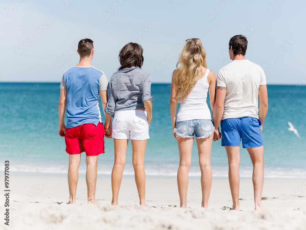 Company of young people on the beach Company of young people on the beach