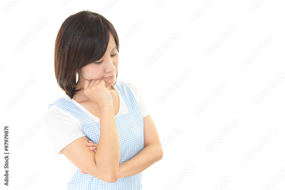 憂鬱な表情の主婦 憂鬱な表情の主婦