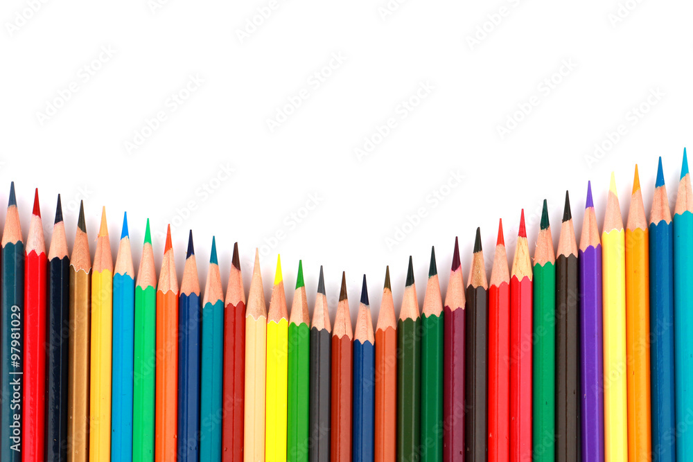 Colorful pencils arranged in a wave isolated over white background Colorful pencils arranged in a wave isolated over white background