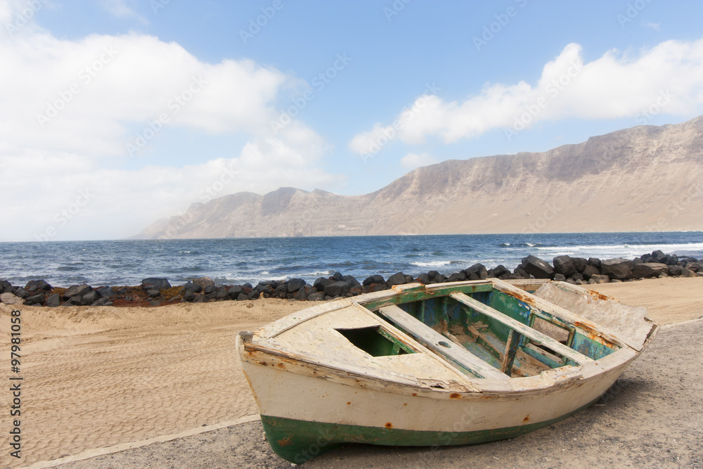 fishing boat on the sand