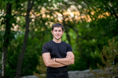 Man at the Park Smiles at Camera