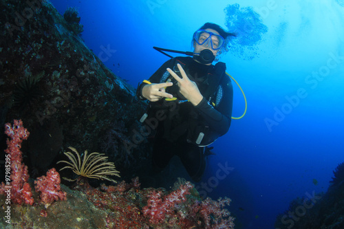 Young woman scuba diver