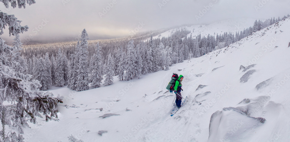 Hiker on a slope of a mountain