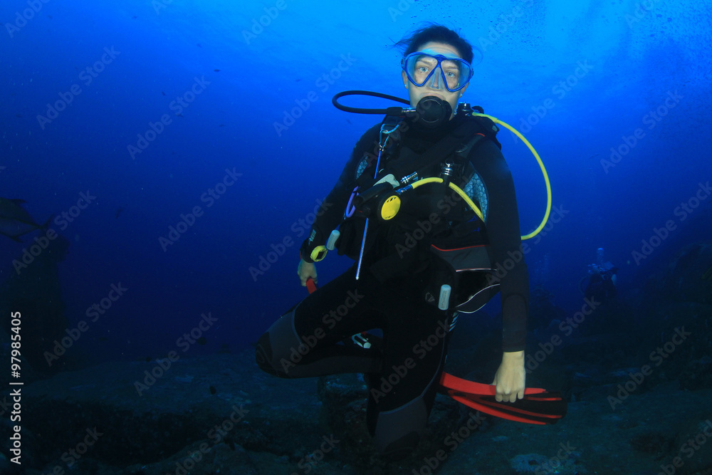 Young woman scuba diver