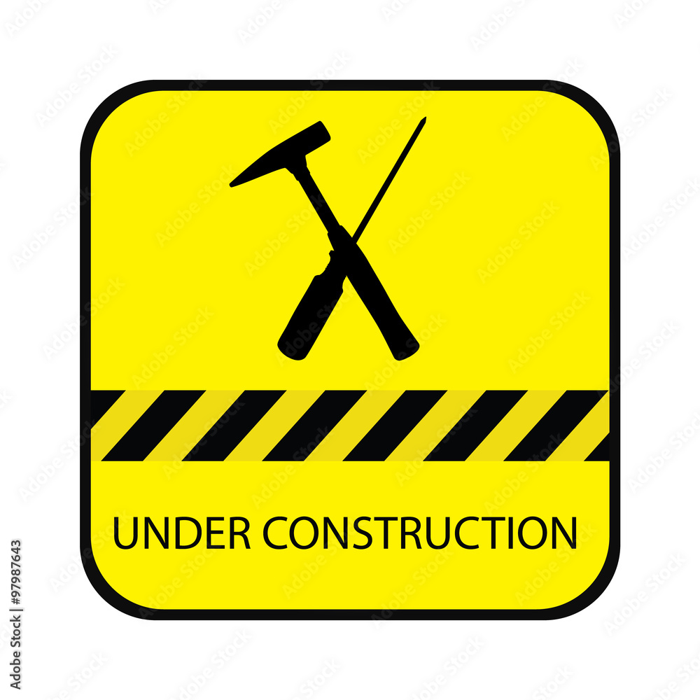 Yellow under construction road sign, with screwdriver, hammer and text under construction Yellow under construction road sign, with screwdriver, hammer and text under construction