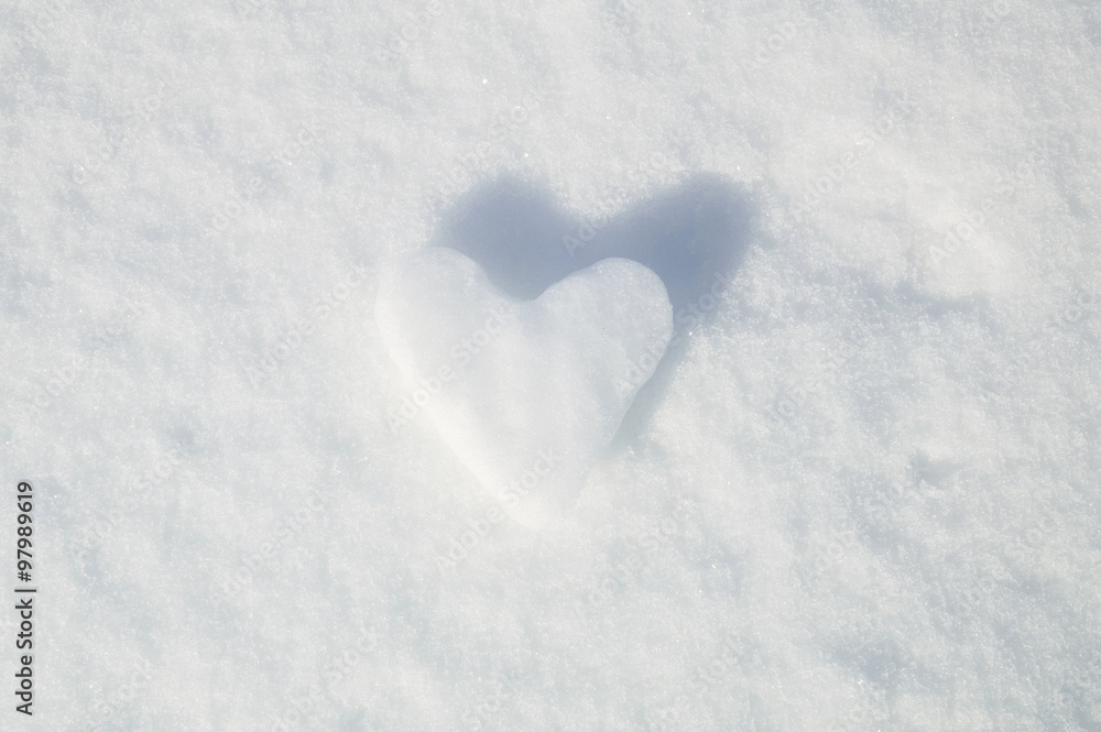 Ice heart on snow background, Valentines Day greetings card concept Ice heart on snow background, Valentines Day greetings card concept