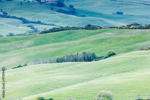 Sunrise over a spring landscape of Tuscany fields, Italy