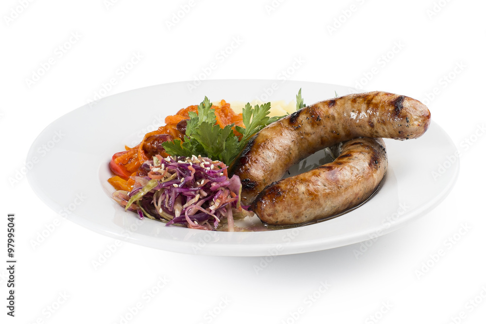 Grilled sausages with potatoes, carrot sauce, and pickled salad Grilled sausages with potatoes, carrot sauce, and pickled salad