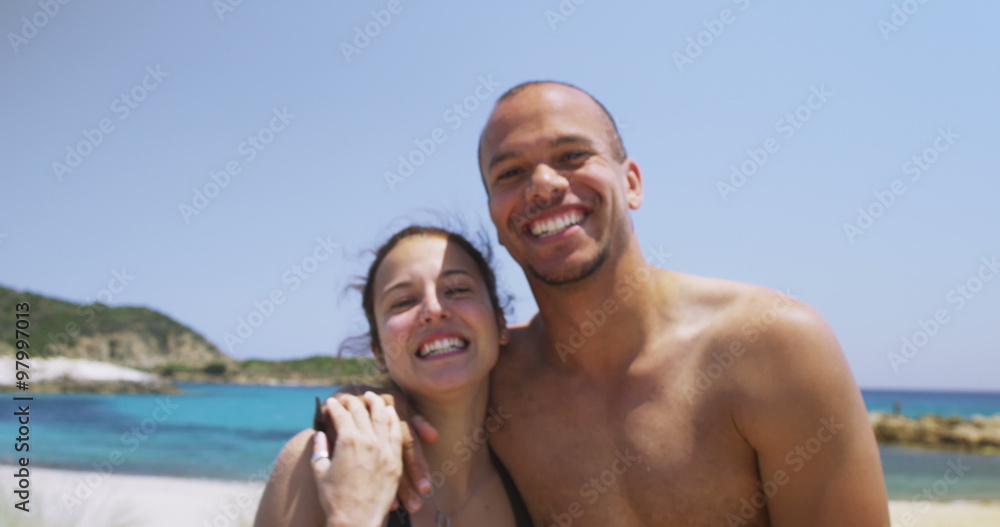 Portrait of happy smiling couple having fun at the beach. Portrait of happy smiling couple having fun at the beach.