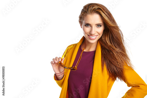 young brunette woman portrait in autumn color