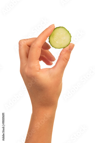 Female Hand with cucumber