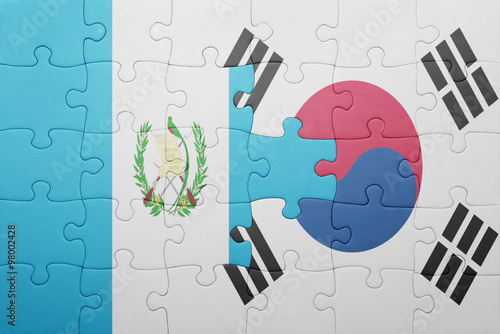 puzzle with the national flag of guatemala and south korea