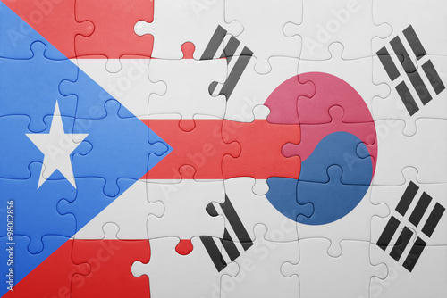puzzle with the national flag of puerto rico and south korea
