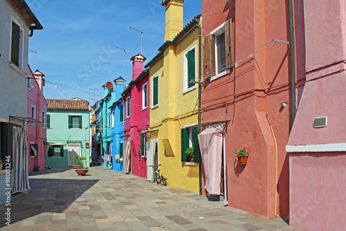 Colorful apartment building in Burano, Venice, Italy. © marimarkina