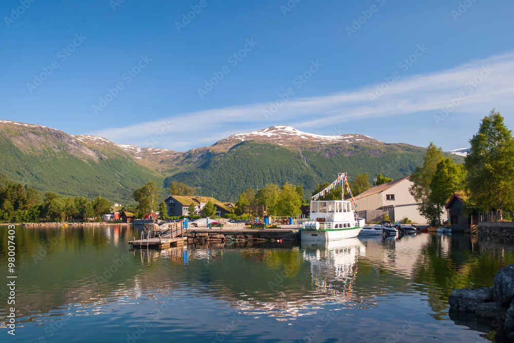 Norway. Pier in the deerena on the bank of the lake in summer da