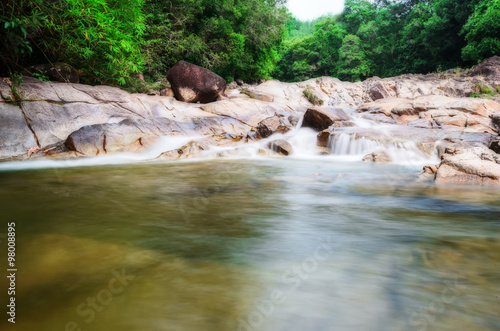 Manora Small Waterfall and rock in tropical forest,Phattalung Province (Un-focus image)