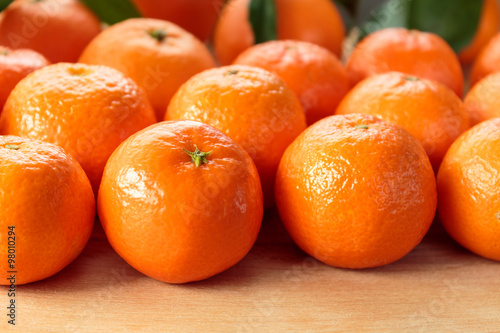 Clementines on rustic wooden table