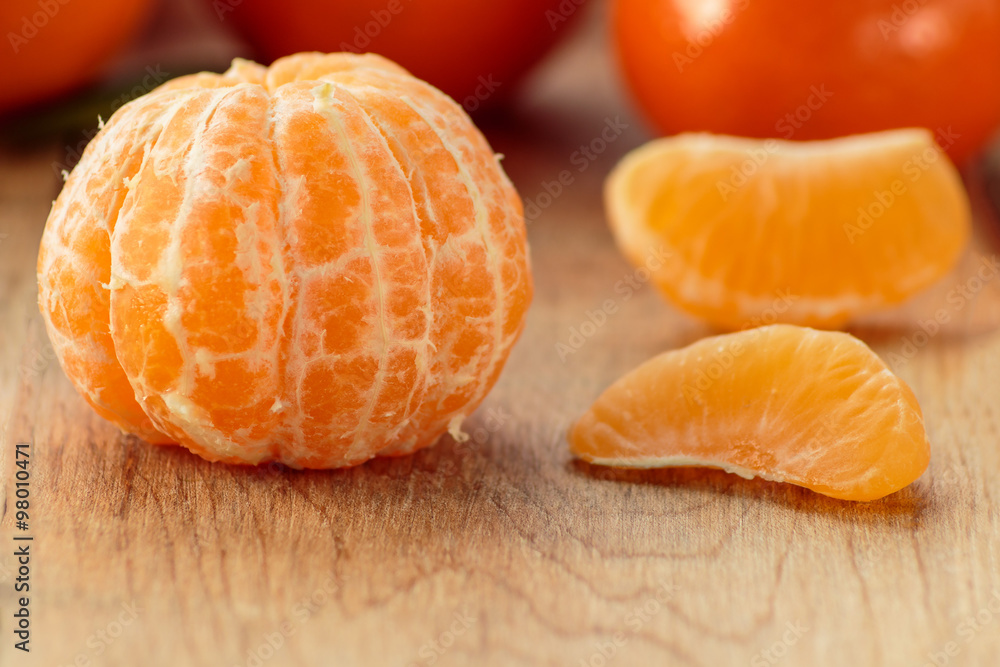 Clementines on rustic wooden table Clementines on rustic wooden table