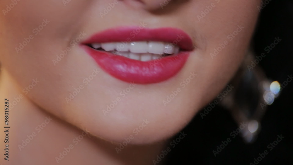 elegant woman engaged in a dialogue. close-up lips elegant woman engaged in a dialogue. close-up lips