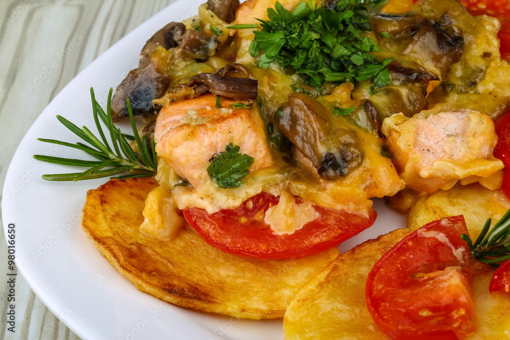 Roasted salmon with potato and tomato Roasted salmon with potato and tomato