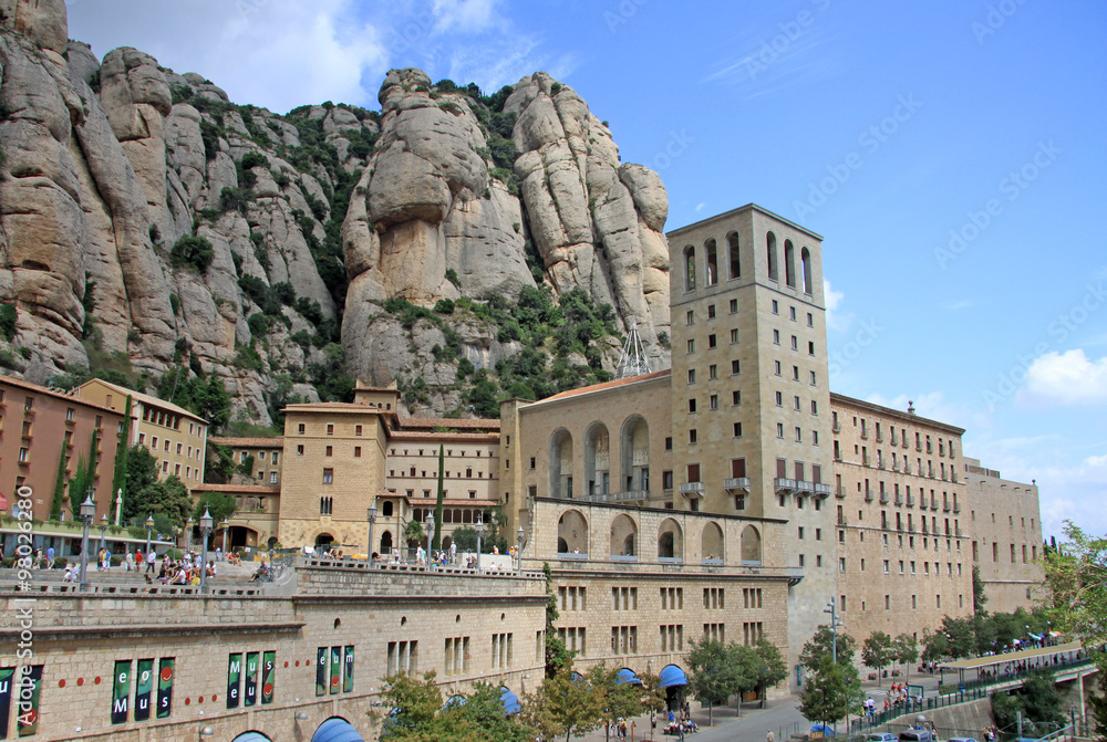 MONTSERRAT, SPAIN - AUGUST 28, 2012: Benedictine abbey Santa Maria de Montserrat in Monistrol de Montserrat, Spain