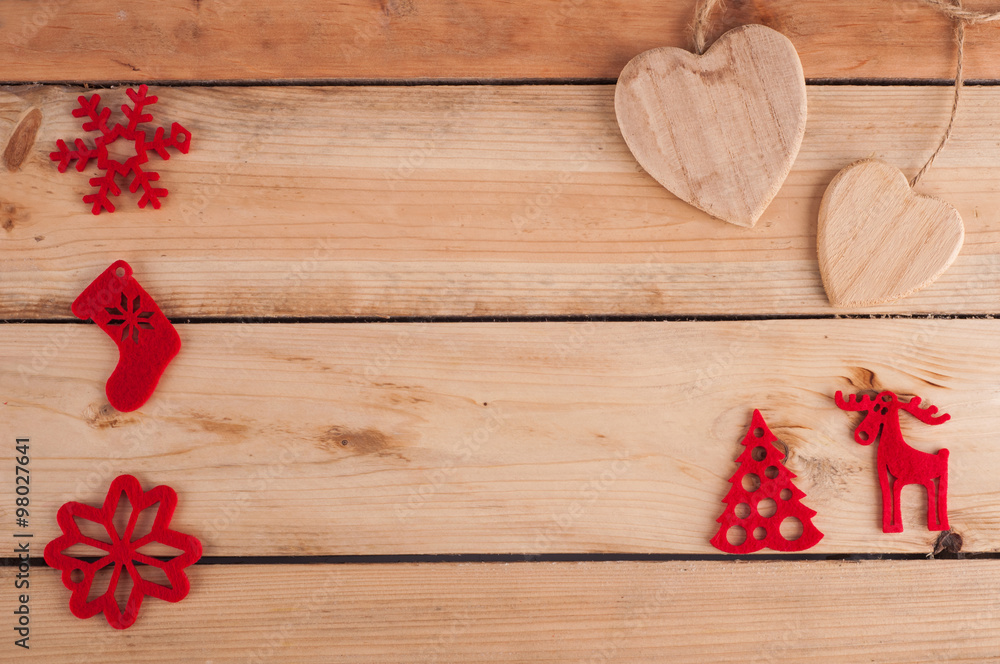 Red Christmas decoration on wooden table Red Christmas decoration on wooden table