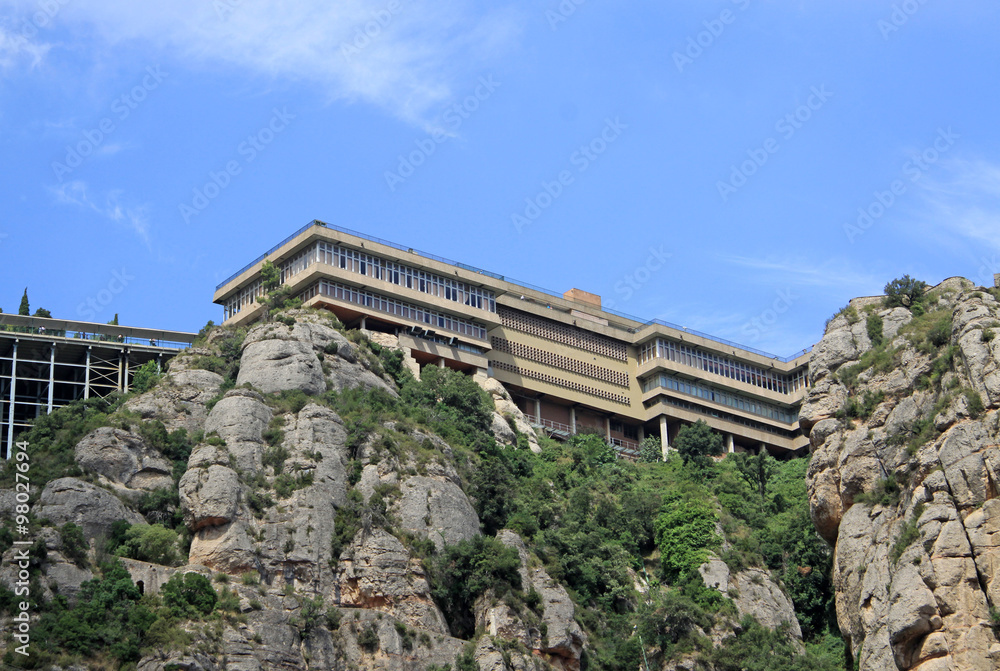 MONTSERRAT, SPAIN - AUGUST 28, 2012: The Benedictine abbey Santa Maria de Montserrat in Monistrol de Montserrat, Spain