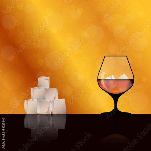Wineglass for alcoholic drinks. Whiskey, scotch and ice cubes. A