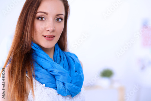 Portrait of attractive female designer in office