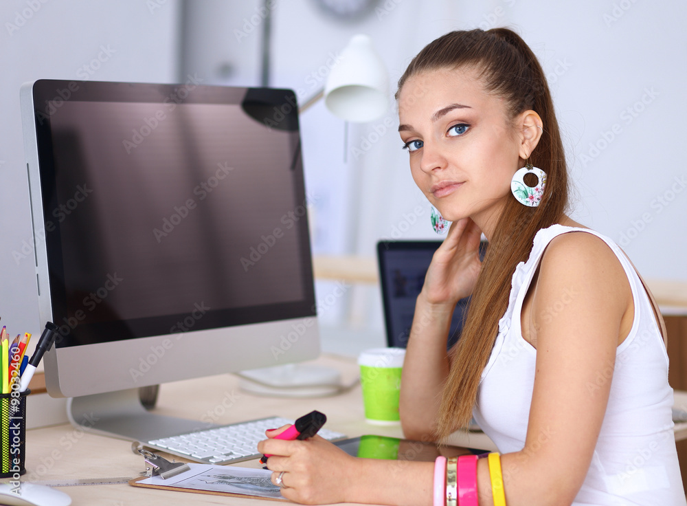Fashion designers working in studio Fashion designers working in studio