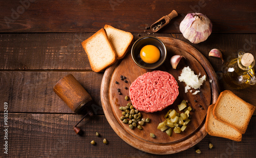 beef tartare on wooden table