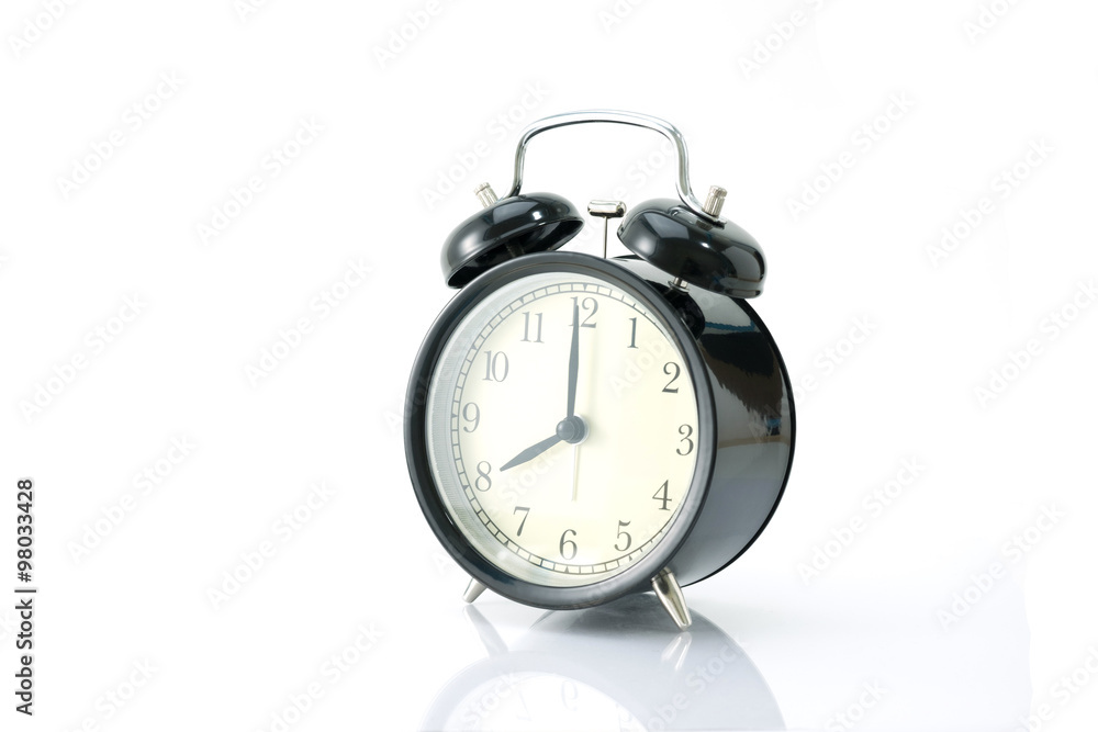 Black alarm clock isolated on white Black alarm clock isolated on white