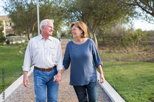 Mature senior couple taking a walk