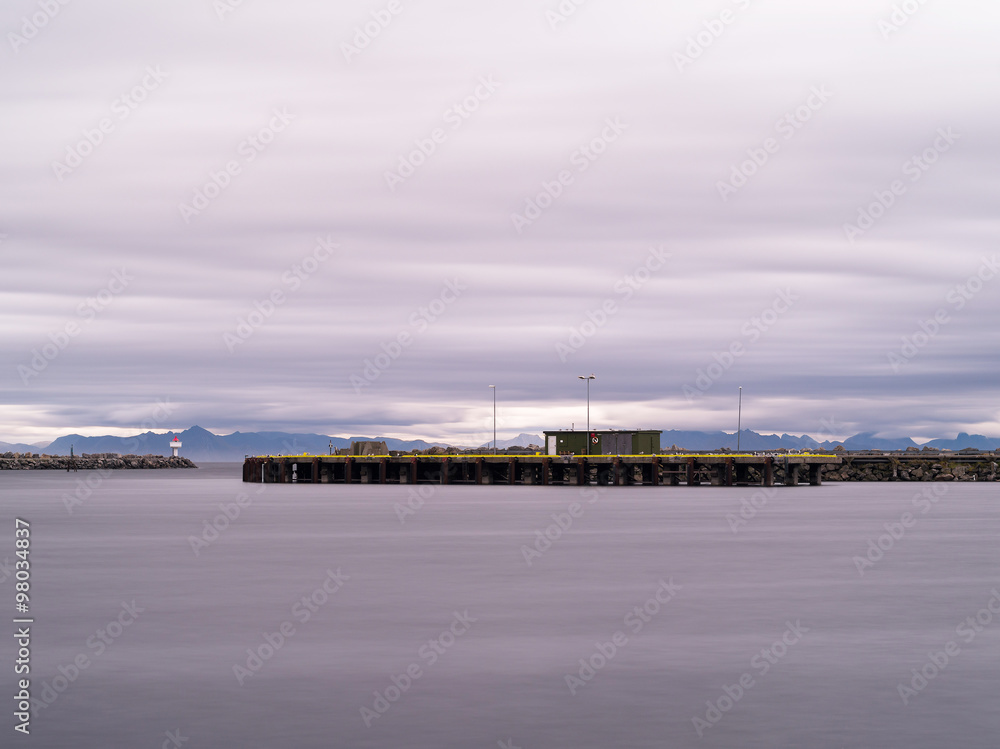 Obraz premium Horizontal dramatic Norway northern pier quay cloudscape backgro