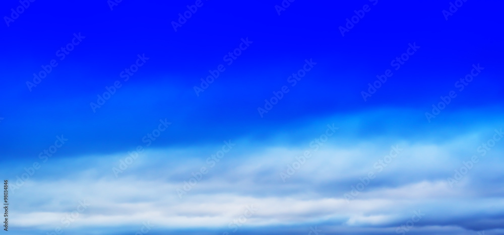 Fototapeta premium HORIZONTAL VIVID BLUE CLOUDSCAPE DRAMATIC BOTTM ALIGNED CLOUDS B