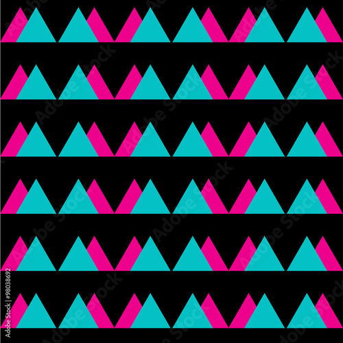 Seamless vintage abstract pattern with triangles in the style of 80 s. Fashion background in Memphis.