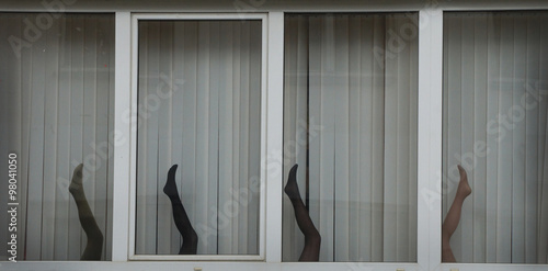 legs of  dummy in the window