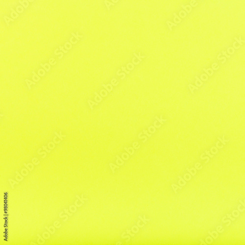 lemon yellow colored square sheet of paper