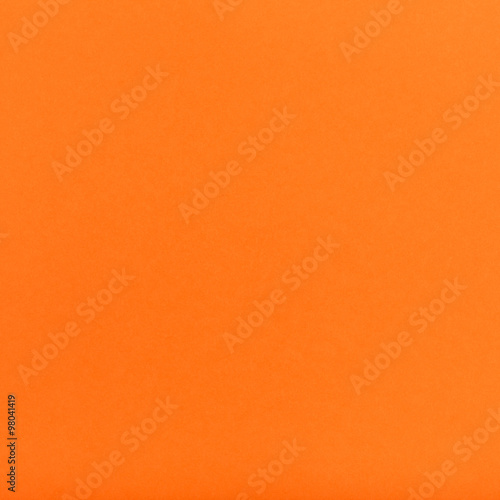 orange colored square sheet of paper photo
