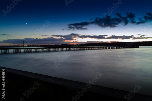 Horizontal vivid vibrant sunset pier dock background backdrop