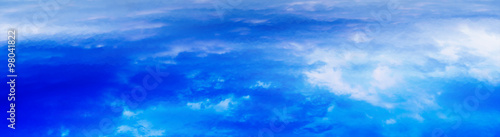 Horizontal wide panorama blue vivid above cloudscape background © spacedrone808